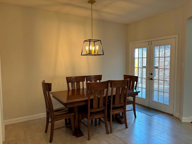 stairs featuring crown molding, a high end fireplace, wood-type flooring, and built in features