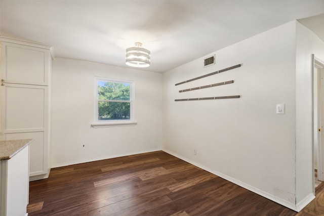 interior space with dark wood-type flooring