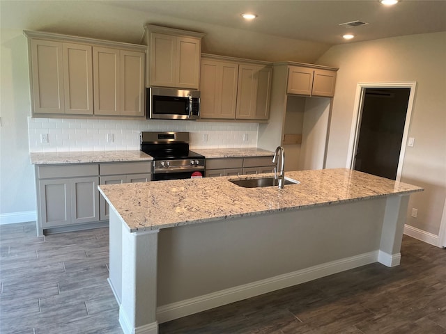 269 Sunnyside Dr, Trenton, TX 75490 - kitchen with appliances with stainless steel finishes, a sink, decorative backsplash, gray cabinets, and recessed lighting
