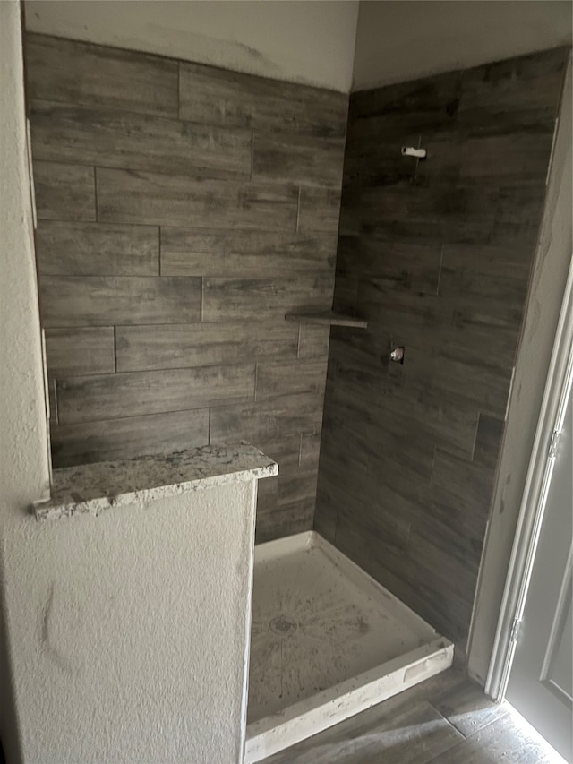 bathroom featuring walk in shower