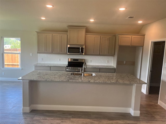 269 Sunnyside Dr, Trenton, TX 75490 - kitchen with appliances with stainless steel finishes, a sink, tasteful backsplash, dark wood-style floors, and recessed lighting