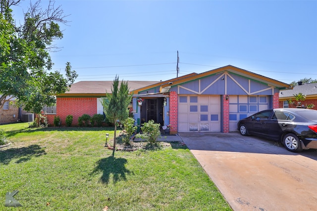 ranch-style home with a garage and a front yard