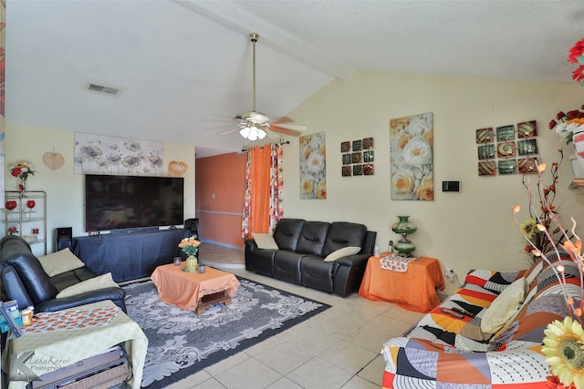 living room featuring vaulted ceiling with beams, ceiling fan, and light tile patterned floors