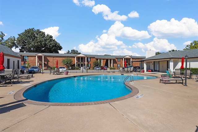 community pool featuring a patio