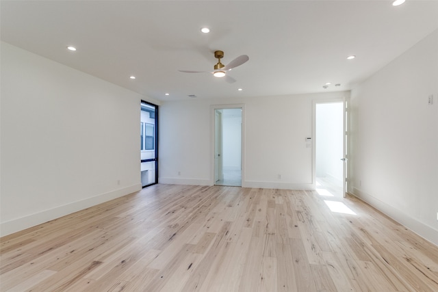 walk in closet with light wood-type flooring