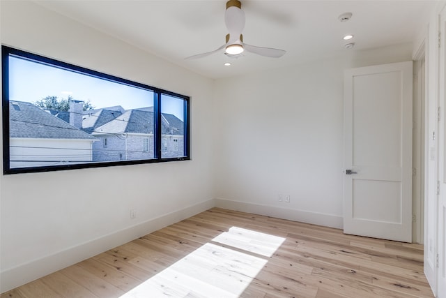 unfurnished room with light hardwood / wood-style floors and ceiling fan