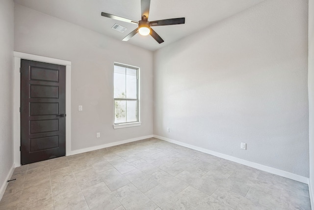 unfurnished room with ceiling fan