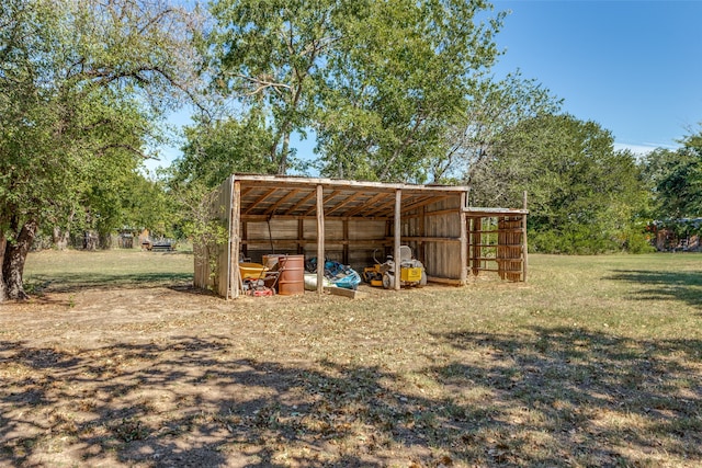 view of outdoor structure with a lawn