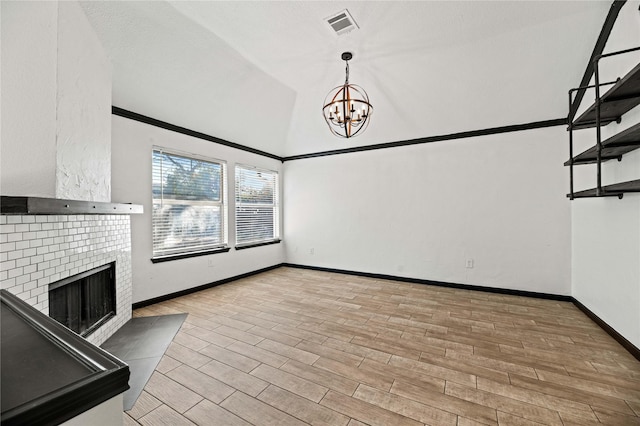 interior space featuring a fireplace and a chandelier