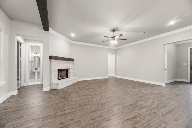 2201 Crystal Palace Blvd, Alvarado, TX 76009 - unfurnished living room with visible vents, a fireplace, ceiling fan, dark wood-style flooring, and baseboards