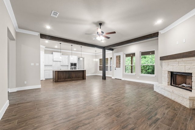 2201 Crystal Palace Blvd, Alvarado, TX 76009 - unfurnished living room featuring baseboards, ornamental molding, and ceiling fan