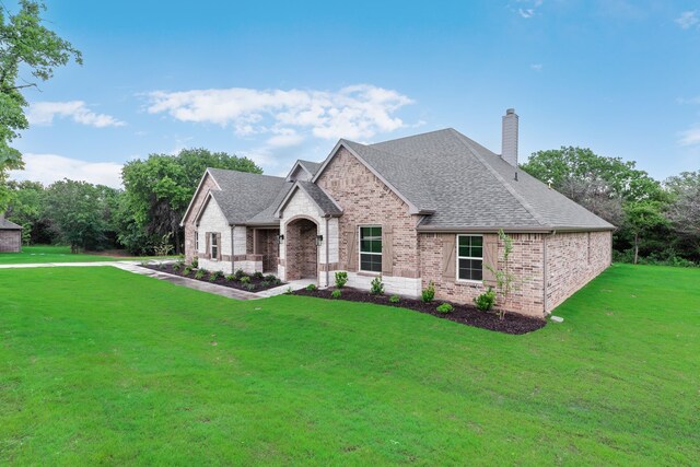 2201 Crystal Palace Blvd, Alvarado, TX 76009 - french provincial home with a front lawn, a shingled roof, brick siding, and a chimney
