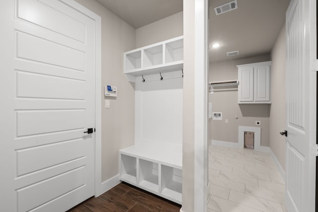 2201 Crystal Palace Blvd, Alvarado, TX 76009 - mudroom with baseboards, marble finish floor, and visible vents