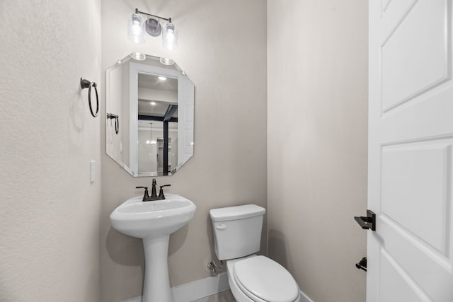 2201 Crystal Palace Blvd, Alvarado, TX 76009 - half bathroom featuring toilet and baseboards