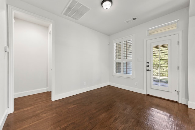 interior space with dark hardwood / wood-style floors