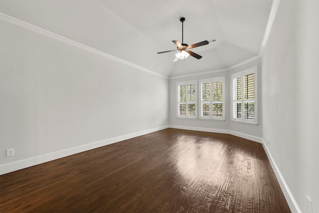 empty room featuring ceiling fan, ornamental molding, vaulted ceiling, and dark hardwood / wood-style floors