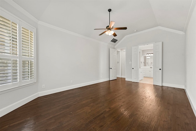 unfurnished living room featuring crown molding, vaulted ceiling, dark hardwood / wood-style floors, and ceiling fan