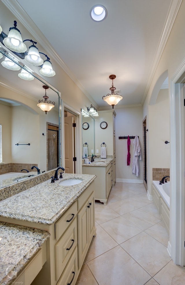 bathroom featuring vanity, crown molding, independent shower and bath, and tile patterned flooring