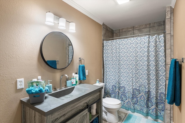 bathroom with vanity, crown molding, a shower with curtain, and toilet