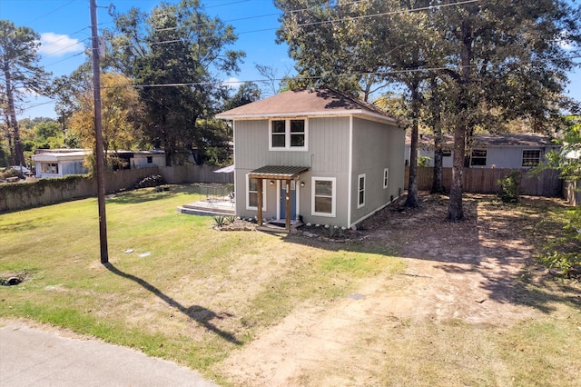 front facade featuring a front lawn