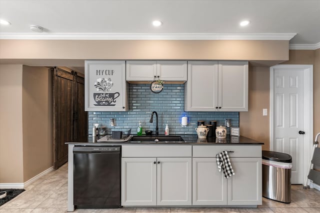 kitchen with white cabinets, a barn door, black dishwasher, and sink