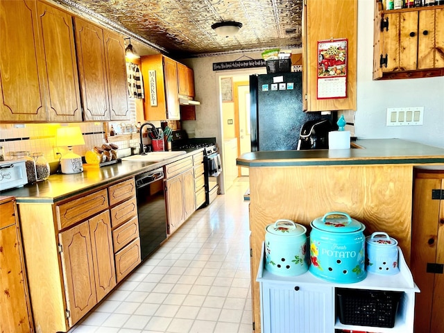 kitchen with gas range oven, dishwasher, sink, and kitchen peninsula