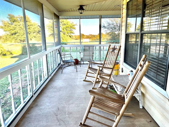 sunroom with wooden ceiling