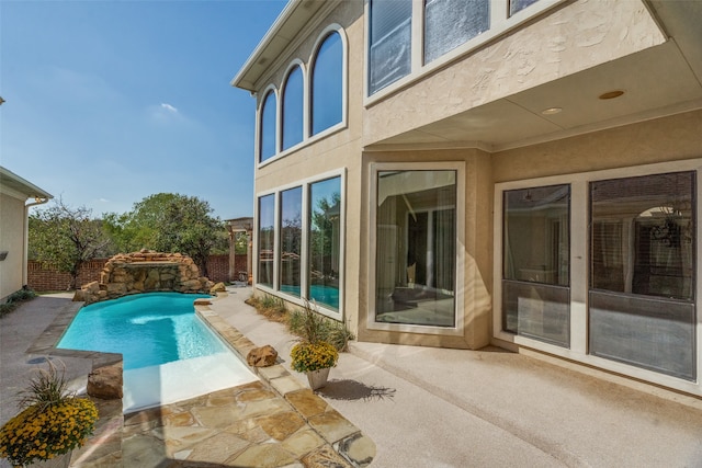 view of pool featuring a patio