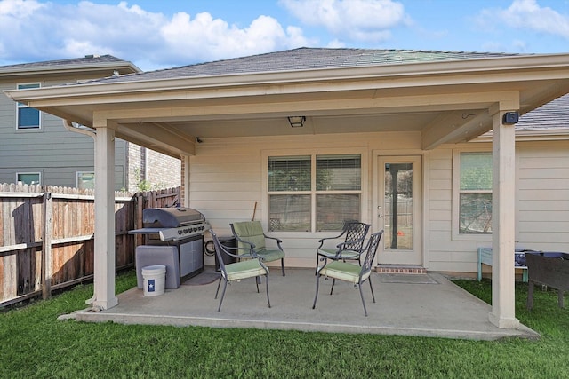 view of patio with a grill