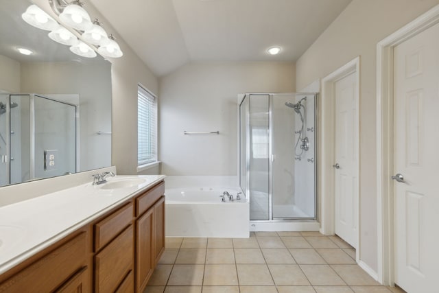 bathroom featuring vanity, lofted ceiling, and plus walk in shower