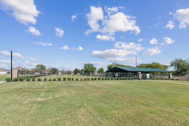 surrounding community featuring a lawn