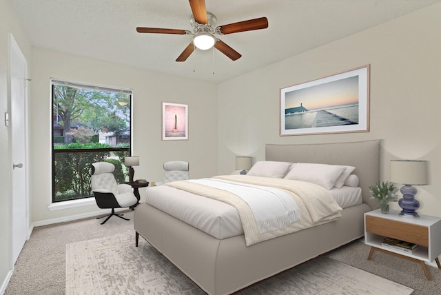 bedroom featuring carpet flooring and ceiling fan