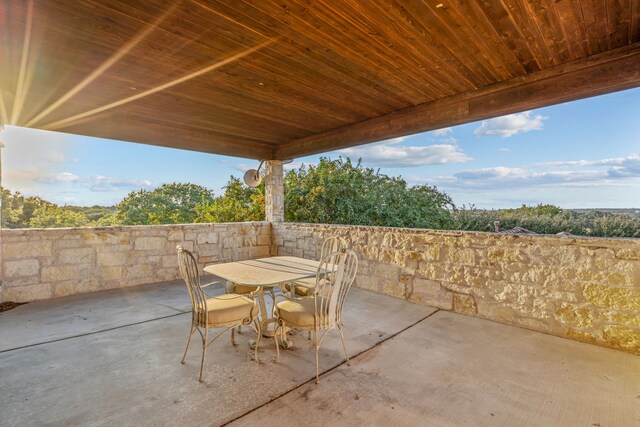 view of swimming pool with a patio and an outdoor fire pit