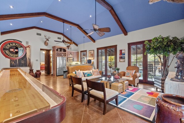 living room featuring dark tile patterned flooring, french doors, ceiling fan, beam ceiling, and high vaulted ceiling