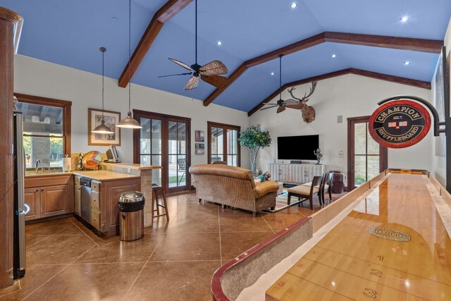 view of pool with a patio, a fire pit, and an in ground hot tub