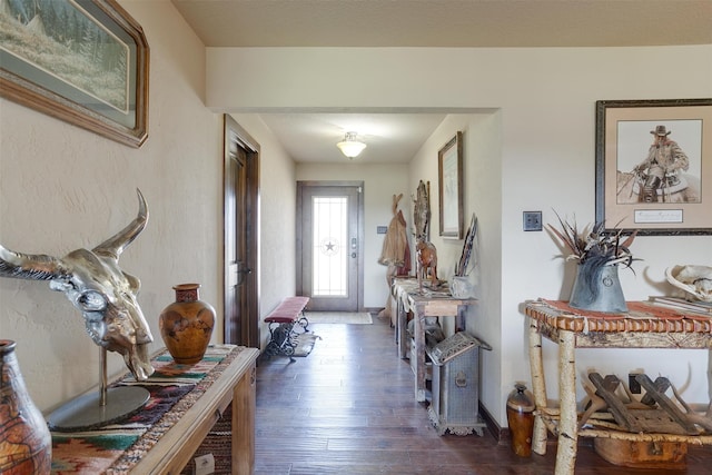 entrance foyer with french doors and dark hardwood / wood-style flooring