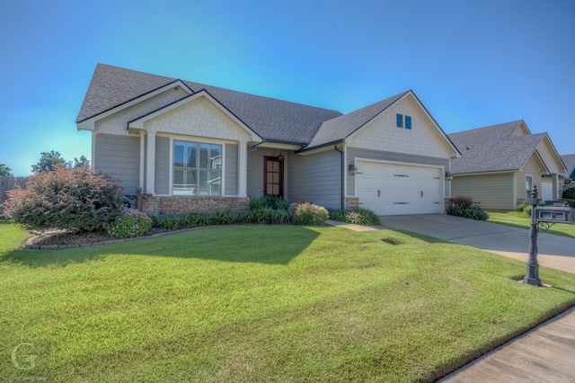 craftsman-style home featuring a front yard and a garage