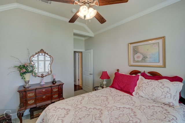 bedroom featuring crown molding, vaulted ceiling, and ceiling fan