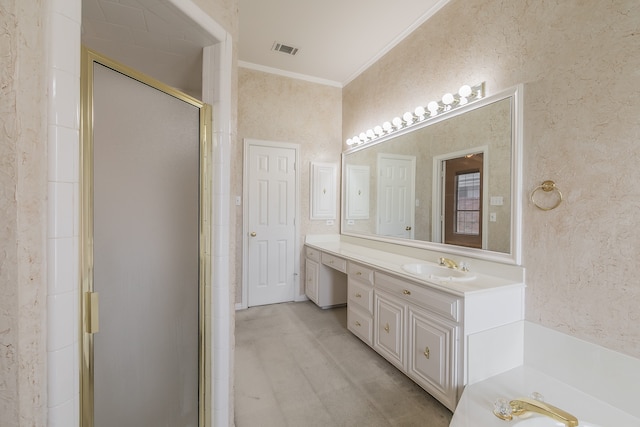 bathroom with vanity, a shower with shower door, and crown molding