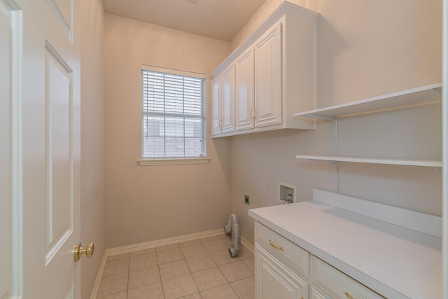 laundry area with cabinets, washer hookup, light tile patterned floors, and electric dryer hookup