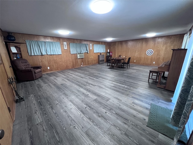 interior space featuring hardwood / wood-style flooring and wood walls