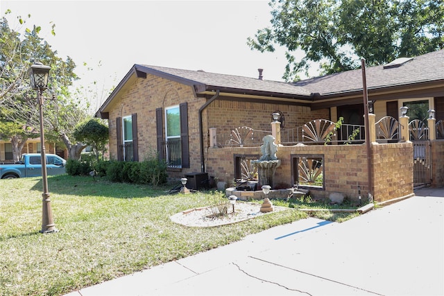 view of property exterior featuring a lawn