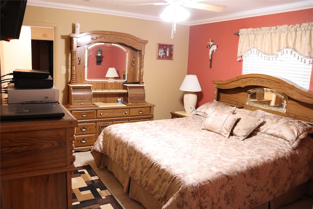 bedroom featuring ornamental molding, carpet floors, and ceiling fan