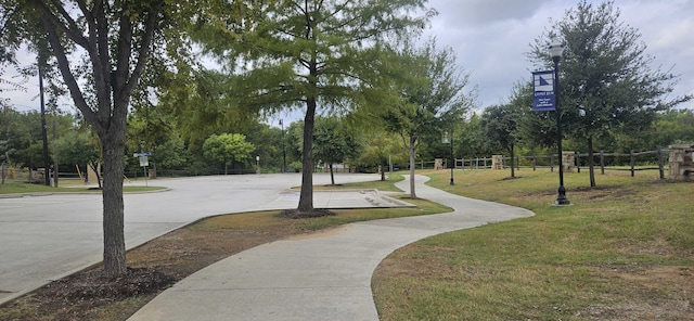 view of community featuring a lawn