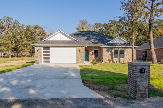 ranch-style house featuring a front yard and a garage