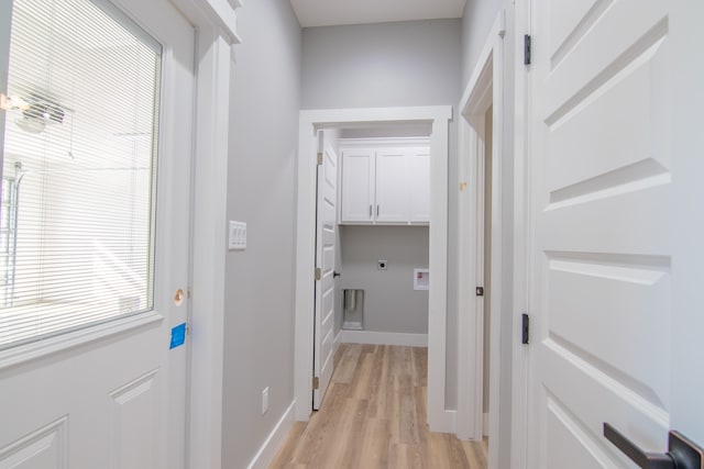 corridor featuring light hardwood / wood-style flooring