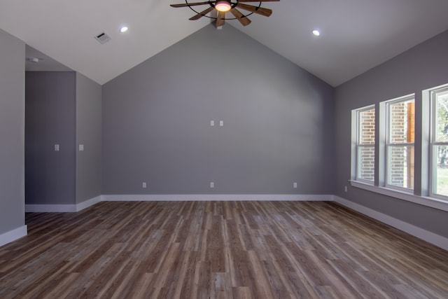 unfurnished living room featuring ceiling fan, hardwood / wood-style floors, and vaulted ceiling