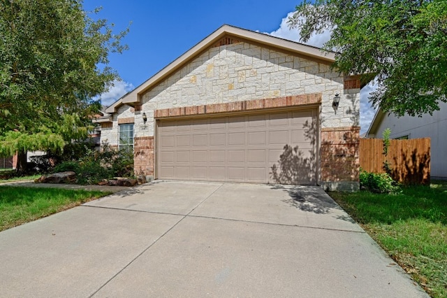 ranch-style home featuring a garage