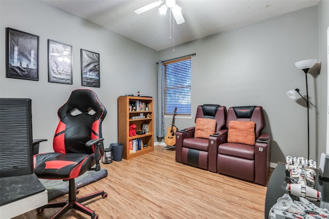 office space featuring ceiling fan and light wood-type flooring