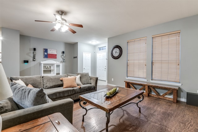 living room with ceiling fan and hardwood / wood-style floors